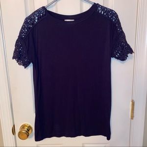 Navy blue top with lacey sleeves